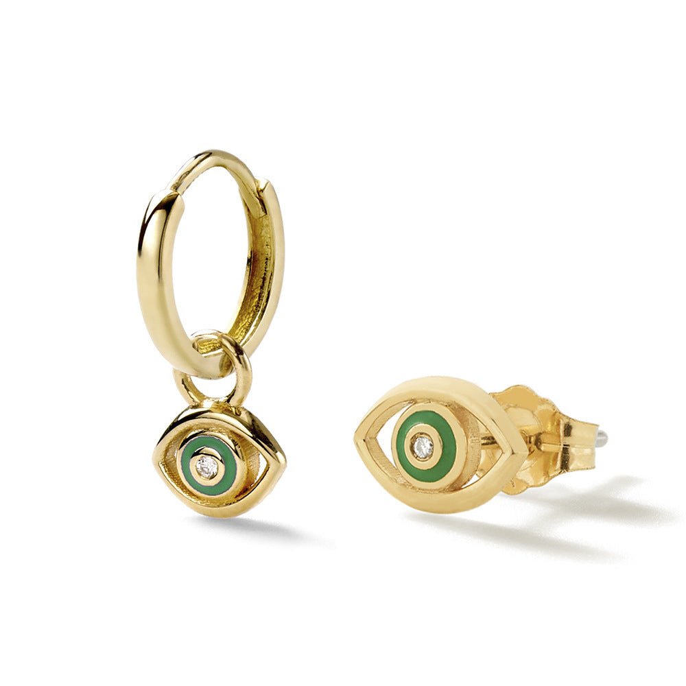 Channel mystery, style, and protection with our Diamond Devil's Eye Stud Earrings – a bold European